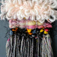 close up detailed photo of the Angeles wall hanging